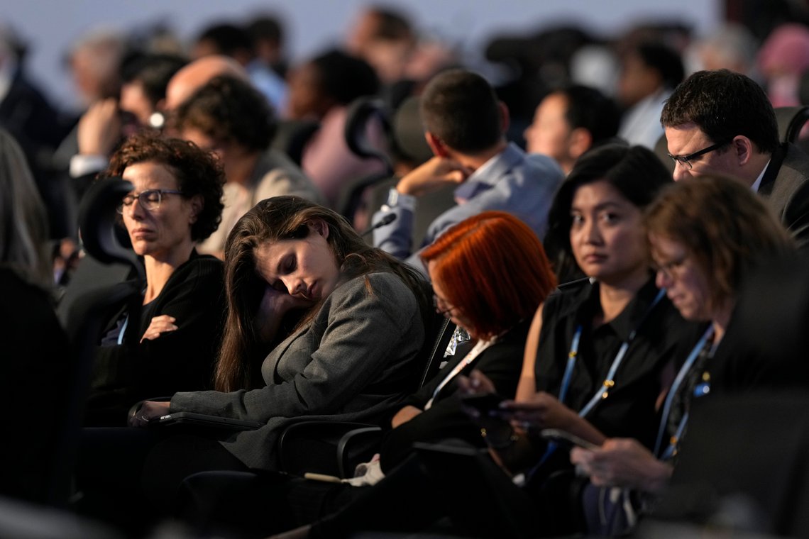 Delegates nap during a closing plenary session at the COP27 U.N. Climate Summit, Sunday, Nov. 20, 2022, in Sharm el-Sheikh, Egypt. (AP Photo/Peter Dejong) Delegates nap during a closing plenary session at the COP27 U.N. Climate Summit, Sunday, Nov. 20, 2022, in Sharm el-Sheikh, Egypt. (AP Photo/Peter Dejong)