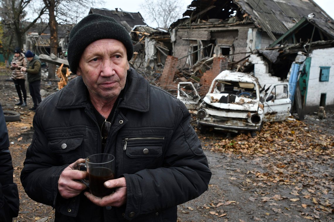 Ivan Kulta, 68, drinks tea next to his destroyed apartment building after Russian shelling in Pokrovsk, Donetsk region, Ukraine, Friday, Nov. 4, 2022. (AP Photo/Andriy Andriyenko) Ivan Kulta, 68, drinks tea next to his destroyed apartment building after Russian shelling in Pokrovsk, Donetsk region, Ukraine, Friday, Nov. 4, 2022. (AP Photo/Andriy Andriyenko)