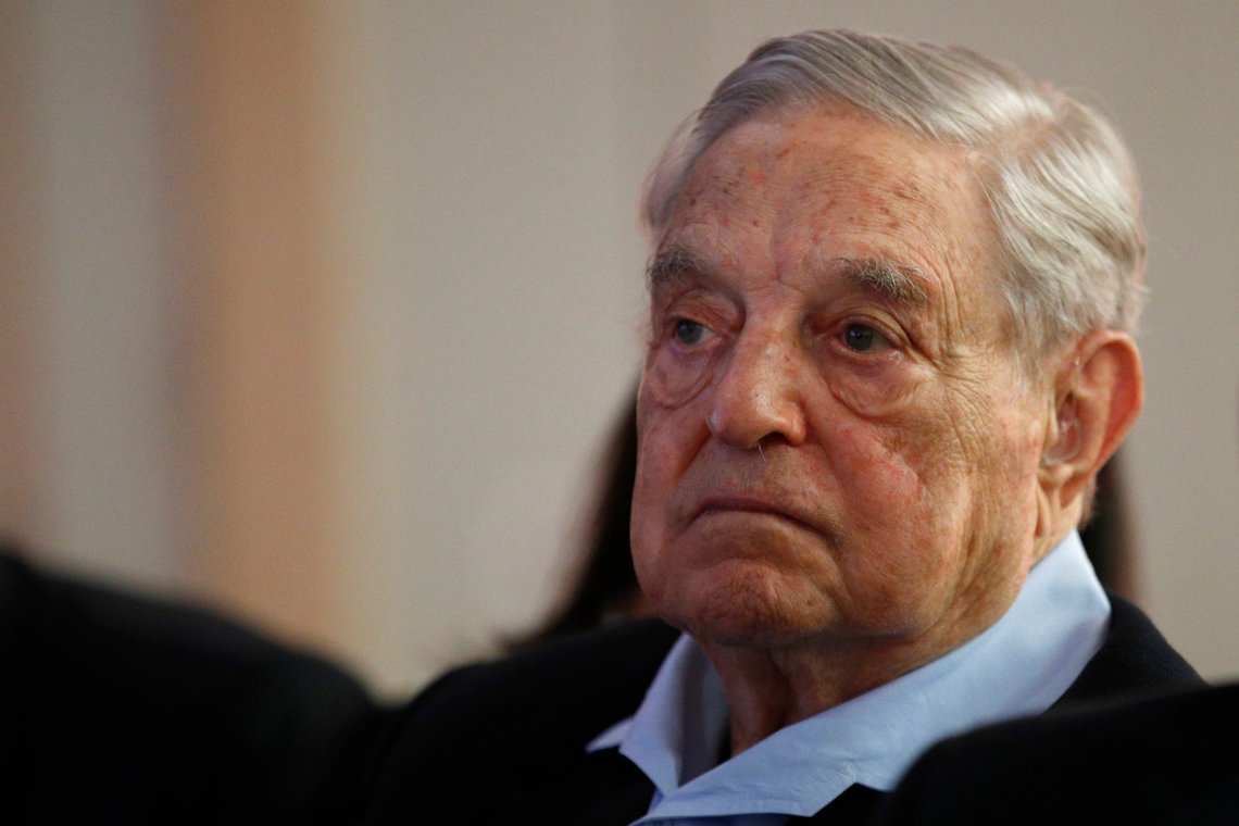FILE- In this May 29, 2018, file photo George Soros, Founder and Chairman of the Open Society Foundations listens to the conference after his speech entitled "How to save the European Union" as he attends the European Council On Foreign Relations Annual Council Meeting in Paris. Having already acknowledged that it did opposition research on Soros, Facebook says No. 2 executive Sheryl Sandberg had asked staff if the billionaire philanthropist had financial motivations against the company. The Friday, Nov. 30, statement is in response a New York Times article that describes Sandberg asking Facebook staff to look into Soros' financial interests in speaking out against the company in January. (AP Photo/Francois Mori, File) FILE- In this May 29, 2018, file photo George Soros, Founder and Chairman of the Open Society Foundations listens to the conference after his speech entitled "How to save the European Union" as he attends the European Council On Foreign Relations Annual Council Meeting in Paris. Having already acknowledged that it did opposition research on Soros, Facebook says No. 2 executive Sheryl Sandberg had asked staff if the billionaire philanthropist had financial motivations against the company. The Friday, Nov. 30, statement is in response a New York Times article that describes Sandberg asking Facebook staff to look into Soros' financial interests in speaking out against the company in January. (AP Photo/Francois Mori, File)
