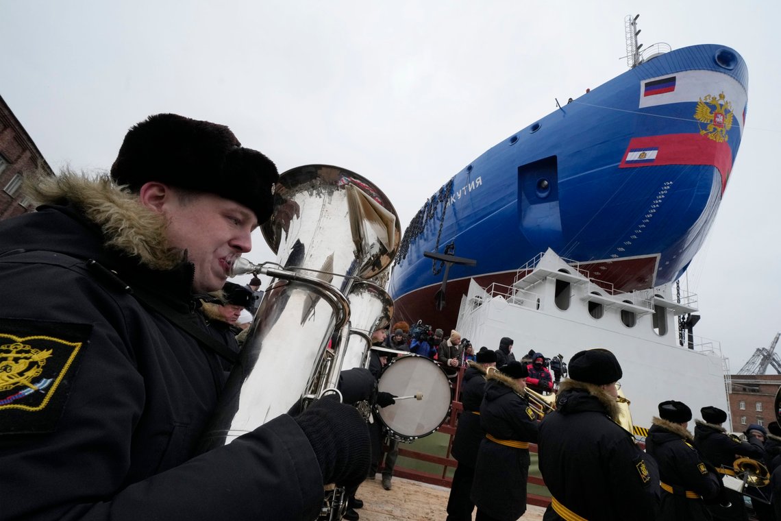 Naval band plays during a launching ceremony of nuclear-powered icebreaker Yakutia, fourth of five icebreakers of Project 22220, at the Baltiysky Shipyard in St. Petersburg, Russia, Tuesday, Nov. 22, 2022. Project 22220 nuclear-powered icebreakers are designed for independent escort of ships and year-round leading caravans in Arctic, in the shallow areas of the Yenisei and the Gulf of Ob, towing ships, as well as providing assistance and performing rescue operations in ice conditions and in clear water. Icebreakers can overcome up to 2.8 meters of solid fast ice. (AP Photo/Dmitri Lovetsky) Naval band plays during a launching ceremony of nuclear-powered icebreaker Yakutia, fourth of five icebreakers of Project 22220, at the Baltiysky Shipyard in St. Petersburg, Russia, Tuesday, Nov. 22, 2022. Project 22220 nuclear-powered icebreakers are designed for independent escort of ships and year-round leading caravans in Arctic, in the shallow areas of the Yenisei and the Gulf of Ob, towing ships, as well as providing assistance and performing rescue operations in ice conditions and in clear water. Icebreakers can overcome up to 2.8 meters of solid fast ice. (AP Photo/Dmitri Lovetsky)