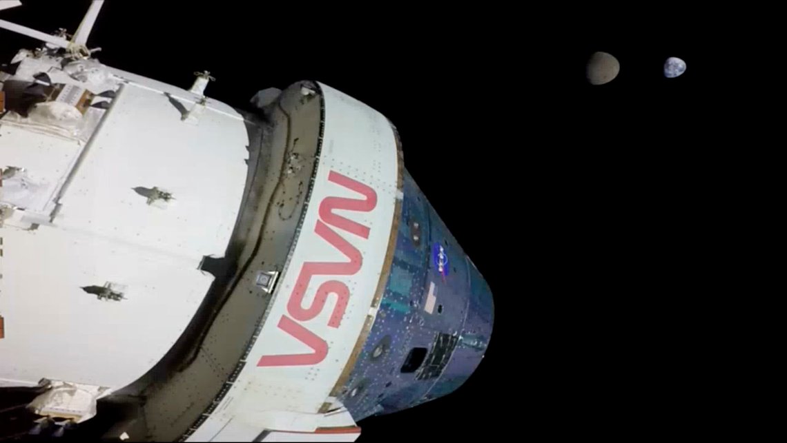In this photo provided by NASA, the Earth and its moon are seen from NASA's Orion spacecraft on Monday, Nov. 28, 2022. Orion and its three test dummies entered lunar orbit on Friday, Nov. 25, more than a week after launching on the first flight of the Artemis program. The spacecraft was expected to reach a maximum distance of almost 270,000 from Earth on Monday. (NASA via AP) In this photo provided by NASA, the Earth and its moon are seen from NASA's Orion spacecraft on Monday, Nov. 28, 2022. Orion and its three test dummies entered lunar orbit on Friday, Nov. 25, more than a week after launching on the first flight of the Artemis program. The spacecraft was expected to reach a maximum distance of almost 270,000 from Earth on Monday. (NASA via AP)