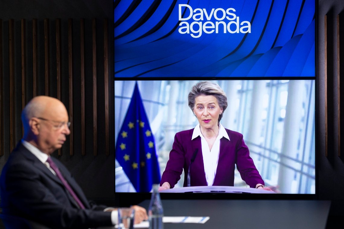 German Klaus Schwab, left, Founder and Executive Chairman of the World Economic Forum, WEF, listens to European Commission President Ursula von der Leyen, displayed on a video screen, during a conference at the Davos Agenda in Cologny near Geneva, Switzerland, Tuesday, Jan. 26, 2021. The Davos Agenda from Jan. 25 to Jan. 29, 2021 is an online edition due to the coronavirus disease (COVID-19) outbreak. (Salvatore Di Nolfi/Keystone via AP) German Klaus Schwab, left, Founder and Executive Chairman of the World Economic Forum, WEF, listens to European Commission President Ursula von der Leyen, displayed on a video screen, during a conference at the Davos Agenda in Cologny near Geneva, Switzerland, Tuesday, Jan. 26, 2021. The Davos Agenda from Jan. 25 to Jan. 29, 2021 is an online edition due to the coronavirus disease (COVID-19) outbreak. (Salvatore Di Nolfi/Keystone via AP)