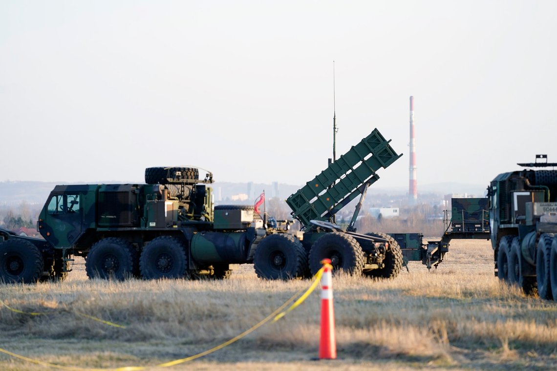 FILE - Patriot missles are seen at the Rzeszow-Jasionka Airport, March 25, 2022, in Jasionka, Poland, as President Joe Biden arrives to board Air Force One enroute to Warsaw, Poland. U.S. officials say the Biden administration is poised to approve sending a Patriot missile battery to Ukraine, finally agreeing to an urgent request from Ukrainian leaders desperate for more robust weapons to shoot down incoming Russian fire. (AP Photo/Evan Vucci, File) FILE - Patriot missles are seen at the Rzeszow-Jasionka Airport, March 25, 2022, in Jasionka, Poland, as President Joe Biden arrives to board Air Force One enroute to Warsaw, Poland. U.S. officials say the Biden administration is poised to approve sending a Patriot missile battery to Ukraine, finally agreeing to an urgent request from Ukrainian leaders desperate for more robust weapons to shoot down incoming Russian fire. (AP Photo/Evan Vucci, File)