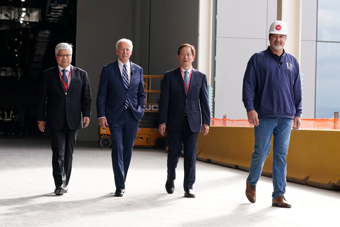 President Joe Biden tours the building site for a new computer chip plant for Taiwan Semiconductor Manufacturing Company, with Chairman Mark Liu, second from right CEO C.C. Wei, left, and Aaron Butler, President of Arizona Building and Construction Trades Council, Tuesday, Dec. 6, 2022, in Phoenix. (AP Photo/Patrick Semansky) President Joe Biden tours the building site for a new computer chip plant for Taiwan Semiconductor Manufacturing Company, with Chairman Mark Liu, second from right CEO C.C. Wei, left, and Aaron Butler, President of Arizona Building and Construction Trades Council, Tuesday, Dec. 6, 2022, in Phoenix. (AP Photo/Patrick Semansky)