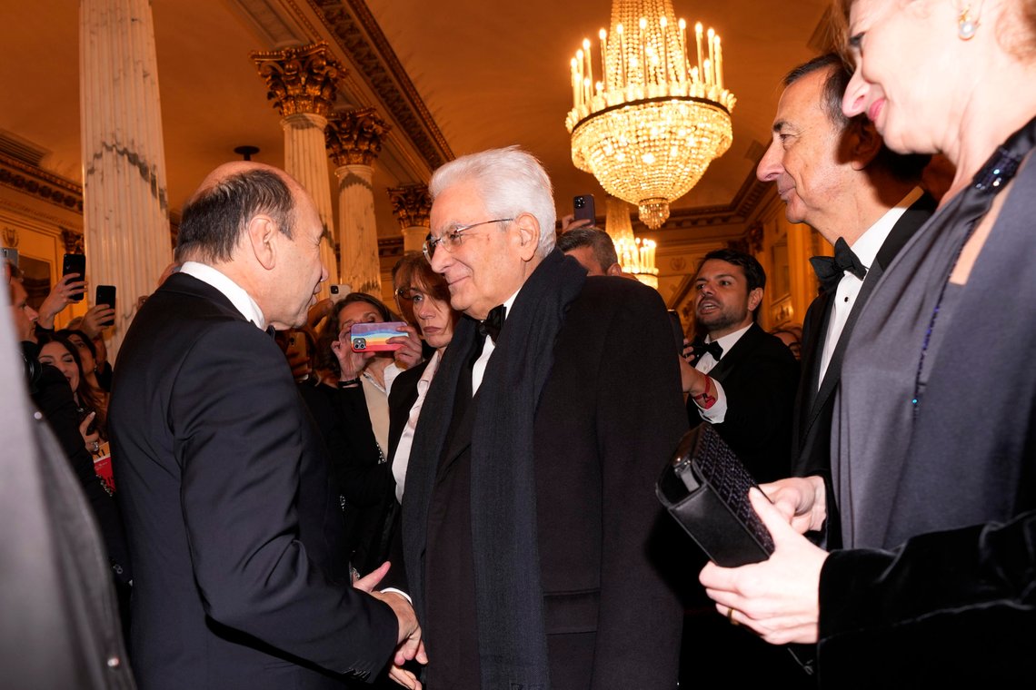 Italian President Sergio Mattarella, center, is received by La Scala Superintendent Dominique Meyer as he arrives for the premiere of Modest Mussorgsky's Boris Godunov in Milan, Italy, Wednesday, Dec. 7, 2022. Italy’s most famous opera house, Teatro alla Scala, opened its new season Wednesday with the Russian opera “Boris Godunov,” against the backdrop of Ukrainian protests that the cultural event is a propaganda win for the Kremlin during Russia’s invasion of Ukraine. (AP Photo/Antonio Calanni) Italian President Sergio Mattarella, center, is received by La Scala Superintendent Dominique Meyer as he arrives for the premiere of Modest Mussorgsky's Boris Godunov in Milan, Italy, Wednesday, Dec. 7, 2022. Italy’s most famous opera house, Teatro alla Scala, opened its new season Wednesday with the Russian opera “Boris Godunov,” against the backdrop of Ukrainian protests that the cultural event is a propaganda win for the Kremlin during Russia’s invasion of Ukraine. (AP Photo/Antonio Calanni)