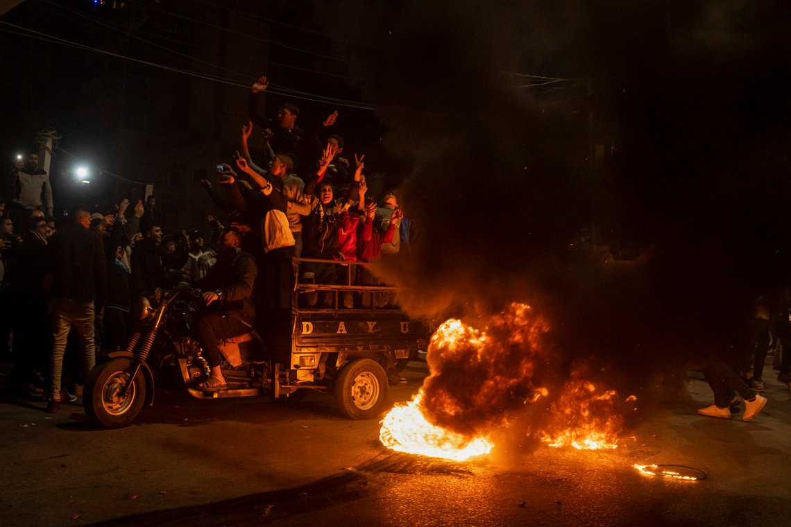 Palestinians celebrate after a shooting attack near a synagogue in Jerusalem, in Gaza City, Friday, Jan. 27, 2023. A Palestinian gunman opened fire outside an east Jerusalem synagogue Friday night, killing seven people, including a 70-year-old woman, and wounding three others before police shot and killed him, officials said. It was the deadliest attack on Israelis in years and raised the likelihood of further bloodshed.(AP Photo/Fatima Shbair) Palestinians celebrate after a shooting attack near a synagogue in Jerusalem, in Gaza City, Friday, Jan. 27, 2023. A Palestinian gunman opened fire outside an east Jerusalem synagogue Friday night, killing seven people, including a 70-year-old woman, and wounding three others before police shot and killed him, officials said. It was the deadliest attack on Israelis in years and raised the likelihood of further bloodshed.(AP Photo/Fatima Shbair)
