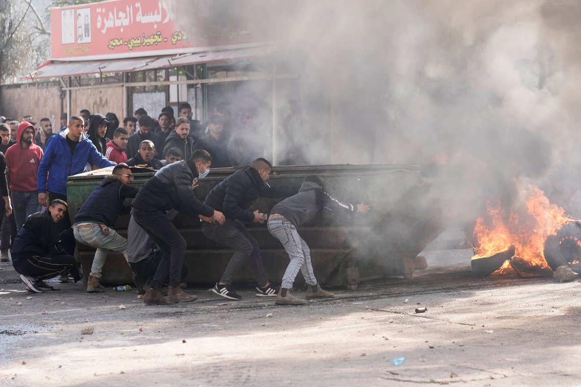 Palestinians clash with Israeli forces following an army raid in the West Bank city of Jenin, Thursday, Jan. 26, 2023. (AP Photo/Majdi Mohammed) Palestinians clash with Israeli forces following an army raid in the West Bank city of Jenin, Thursday, Jan. 26, 2023. (AP Photo/Majdi Mohammed)