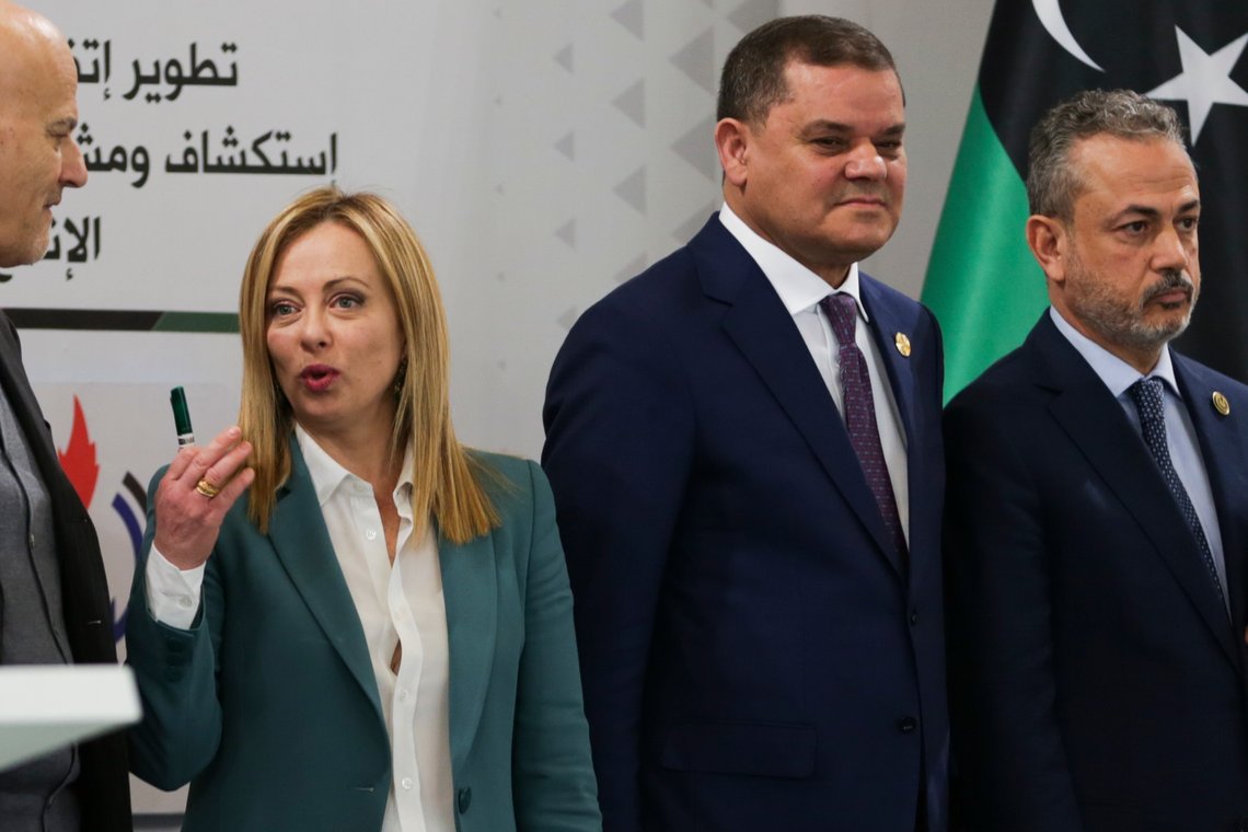 Italian Prime Minister Giorgia Meloni stands next to one of the Libya's rival prime ministers Abdul Hamid Dbeib, right, a during a conference in Tripoli, Libya, Saturday, Jan. 28, 20223. (AP Photo/Yousef Murad) Italian Prime Minister Giorgia Meloni stands next to one of the Libya's rival prime ministers Abdul Hamid Dbeib, right, a during a conference in Tripoli, Libya, Saturday, Jan. 28, 20223. (AP Photo/Yousef Murad)