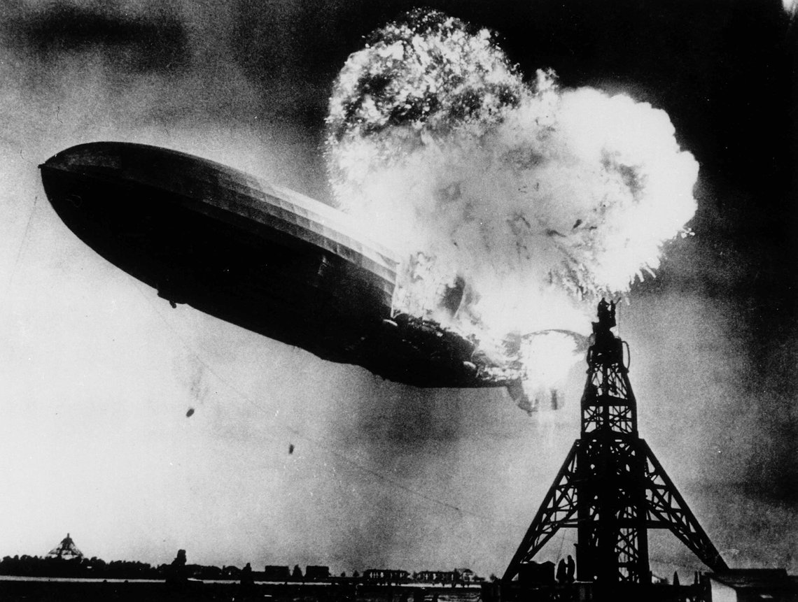 FILE - This May 6, 1937 file photo, provided by the Philadelphia Public Ledger, was taken at almost the split second that the Hindenburg exploded over the Lakehurst Naval Air Station in Lakehurst, N.J. Only one person is left of the 62 passengers and crew who survived when the Hindenburg burst into flames 80 years ago Saturday, May 6, 2017. Werner Doehner was 8 years old when he boarded the zeppelin with his parents and older siblings after their vacation to Germany in 1937. The 88-year-old now living in Parachute, Colo., tells The Associated Press that the airship pitched as it tried to land in New Jersey and that "suddenly the air was on fire." (AP Photo, File) FILE - This May 6, 1937 file photo, provided by the Philadelphia Public Ledger, was taken at almost the split second that the Hindenburg exploded over the Lakehurst Naval Air Station in Lakehurst, N.J. Only one person is left of the 62 passengers and crew who survived when the Hindenburg burst into flames 80 years ago Saturday, May 6, 2017. Werner Doehner was 8 years old when he boarded the zeppelin with his parents and older siblings after their vacation to Germany in 1937. The 88-year-old now living in Parachute, Colo., tells The Associated Press that the airship pitched as it tried to land in New Jersey and that "suddenly the air was on fire." (AP Photo, File)