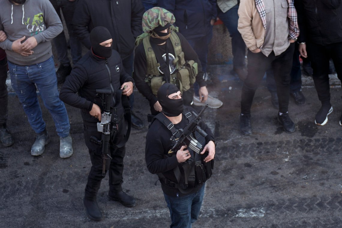 A Palestinian gunman fires into the air during the funeral for 10 men killed in clashes with Israel troops in the West Bank city of Nablus , Wednesday, Feb. 22, 2023. Palestinian officials say that at least 10 Palestinians have been killed and 102 were wounded during a rare daytime Israeli army arrest raid in the occupied West Bank. The Palestinian Health Ministry says a 72-year-old man was among the dead. (AP Photo/Majdi Mohammed) A Palestinian gunman fires into the air during the funeral for 10 men killed in clashes with Israel troops in the West Bank city of Nablus , Wednesday, Feb. 22, 2023. Palestinian officials say that at least 10 Palestinians have been killed and 102 were wounded during a rare daytime Israeli army arrest raid in the occupied West Bank. The Palestinian Health Ministry says a 72-year-old man was among the dead. (AP Photo/Majdi Mohammed)