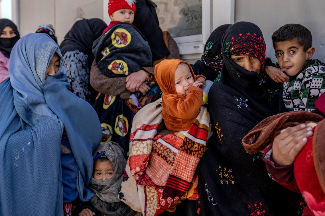 Mothers along with babies who suffer from malnutrition wait to receive help and check-up at a clinic that run by the WFP, in Kabul, Afghanistan, Thursday, Jan. 26, 2023. A spokesman for the U.N. food agency says malnutrition rates in Afghanistan are at record highs. Aid agencies have been providing food, education, healthcare and other critical support to people, but distribution has been severely impacted by a Taliban edict banning women from working at national and international nongovernmental groups. (AP Photo/Ebrahim Noroozi) Mothers along with babies who suffer from malnutrition wait to receive help and check-up at a clinic that run by the WFP, in Kabul, Afghanistan, Thursday, Jan. 26, 2023. A spokesman for the U.N. food agency says malnutrition rates in Afghanistan are at record highs. Aid agencies have been providing food, education, healthcare and other critical support to people, but distribution has been severely impacted by a Taliban edict banning women from working at national and international nongovernmental groups. (AP Photo/Ebrahim Noroozi)