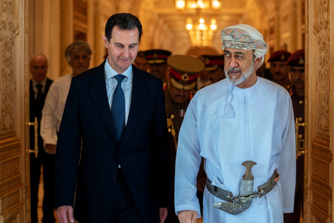 In this photo released by the official Syrian state news agency SANA, Omani Sultan Haitham bin Tariq, right, receives Syrian President Bashar Assad in the capital Muscat, Oman, Monday, Feb. 20, 2023. Assad visited the gulf nation of Oman Monday on his first official visit since the deadly Feb. 6 quake, his office said. (SANA via AP) In this photo released by the official Syrian state news agency SANA, Omani Sultan Haitham bin Tariq, right, receives Syrian President Bashar Assad in the capital Muscat, Oman, Monday, Feb. 20, 2023. Assad visited the gulf nation of Oman Monday on his first official visit since the deadly Feb. 6 quake, his office said. (SANA via AP)