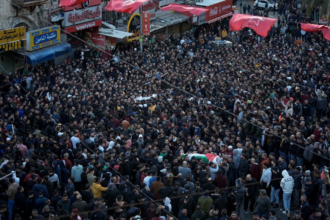 Palestinians carry the bodies of 10 men killed in clashes with Israel troops in the West Bank city of Nablus, Wednesday, Feb. 22, 2023. Palestinian officials say that at least 10 Palestinians have been killed and 102 were wounded during a rare daytime Israeli army arrest raid in the occupied West Bank. The Palestinian Health Ministry says a 72-year-old man was among the dead. (AP Photo/Majdi Mohammed) Palestinians carry the bodies of 10 men killed in clashes with Israel troops in the West Bank city of Nablus, Wednesday, Feb. 22, 2023. Palestinian officials say that at least 10 Palestinians have been killed and 102 were wounded during a rare daytime Israeli army arrest raid in the occupied West Bank. The Palestinian Health Ministry says a 72-year-old man was among the dead. (AP Photo/Majdi Mohammed)
