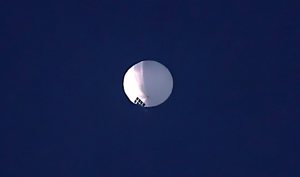 ADDS PENTAGON RESPONSE THAT IT WOULD NOT CONFIRM - A high altitude balloon floats over Billings, Mont., on Wednesday, Feb. 1, 2023. The U.S. is tracking a suspected Chinese surveillance balloon that has been spotted over U.S. airspace for a couple days, but the Pentagon decided not to shoot it down due to risks of harm for people on the ground, officials said Thursday, Feb. 2, 2023. The Pentagon would not confirm that the balloon in the photo was the surveillance balloon. (Larry Mayer/The Billings Gazette via AP) ADDS PENTAGON RESPONSE THAT IT WOULD NOT CONFIRM - A high altitude balloon floats over Billings, Mont., on Wednesday, Feb. 1, 2023. The U.S. is tracking a suspected Chinese surveillance balloon that has been spotted over U.S. airspace for a couple days, but the Pentagon decided not to shoot it down due to risks of harm for people on the ground, officials said Thursday, Feb. 2, 2023. The Pentagon would not confirm that the balloon in the photo was the surveillance balloon. (Larry Mayer/The Billings Gazette via AP)