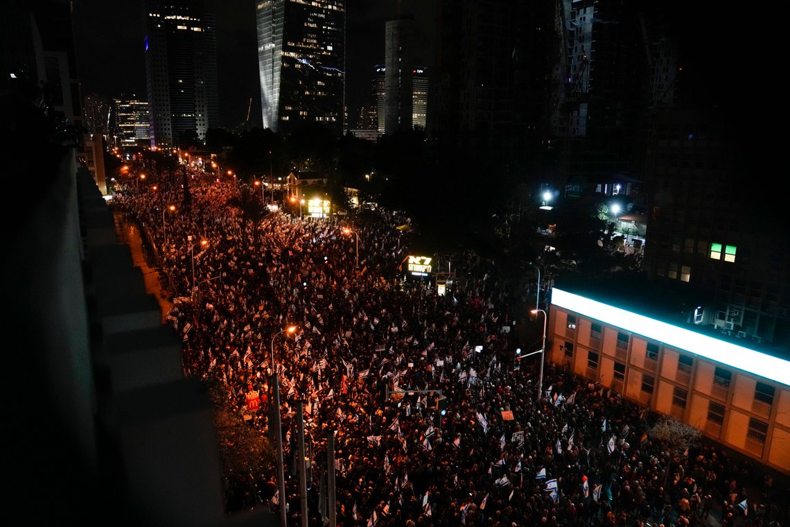Israelis protest against the plans by Prime Minister Benjamin Netanyahu's new government to overhaul the judicial system, in Tel Aviv, Israel, Saturday, Feb. 4, 2023. (AP Photo/Maya Alleruzzo) Israelis protest against the plans by Prime Minister Benjamin Netanyahu's new government to overhaul the judicial system, in Tel Aviv, Israel, Saturday, Feb. 4, 2023. (AP Photo/Maya Alleruzzo)