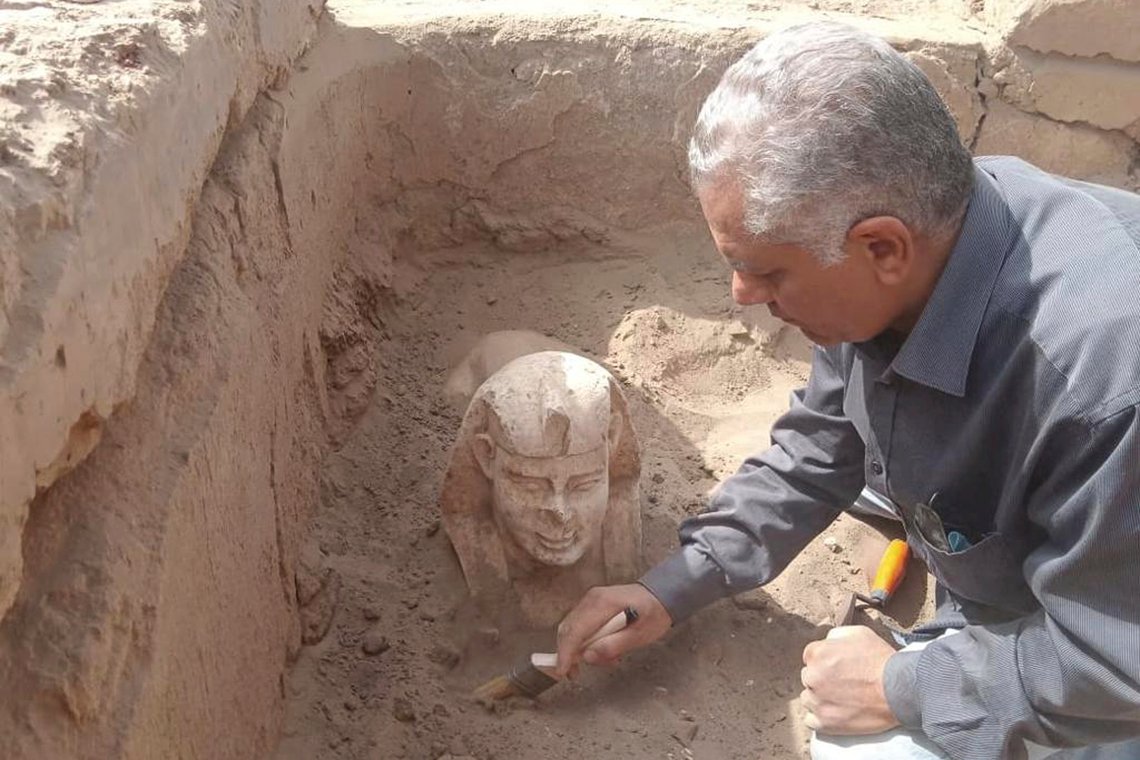 In this undated photo distributed Monday, March 6, 2023, by the Egyptian Ministry of Tourism and Antiquities, a sphinx statue believed to be made in the likeness of a Roman emperor is uncovered from an archaeological site in Qena, Egypt. The site that also contains a shrine to the Ancient Egyptian god Horus dating back to the Roman era, according to the country’s top antiquities official Mostafa Waziri. Waziri also said in a statement that initial examinations point to the statue being modeled after the Roman Emperor Claudius, who ruled in the first century AD. (Egyptian Ministry of Tourism and Antiquities via AP) In this undated photo distributed Monday, March 6, 2023, by the Egyptian Ministry of Tourism and Antiquities, a sphinx statue believed to be made in the likeness of a Roman emperor is uncovered from an archaeological site in Qena, Egypt. The site that also contains a shrine to the Ancient Egyptian god Horus dating back to the Roman era, according to the country’s top antiquities official Mostafa Waziri. Waziri also said in a statement that initial examinations point to the statue being modeled after the Roman Emperor Claudius, who ruled in the first century AD. (Egyptian Ministry of Tourism and Antiquities via AP)