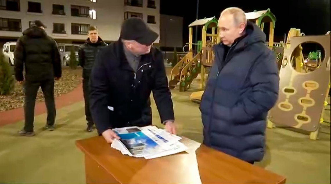 In this photo taken from video released by Russian Presidential Press Office on Sunday, March 19, 2023, Russian President Vladimir Putin, right, listens to Russian Deputy Prime Minister Marat Khusnullin at a newly built neighborhood during their visit to Mariupol in Russian-controlled Donetsk region, Ukraine. Putin has traveled to Crimea to mark the ninth anniversary of the Black Sea peninsula's annexation from Ukraine. (Russian Presidential Press Office via AP) In this photo taken from video released by Russian Presidential Press Office on Sunday, March 19, 2023, Russian President Vladimir Putin, right, listens to Russian Deputy Prime Minister Marat Khusnullin at a newly built neighborhood during their visit to Mariupol in Russian-controlled Donetsk region, Ukraine. Putin has traveled to Crimea to mark the ninth anniversary of the Black Sea peninsula's annexation from Ukraine. (Russian Presidential Press Office via AP)