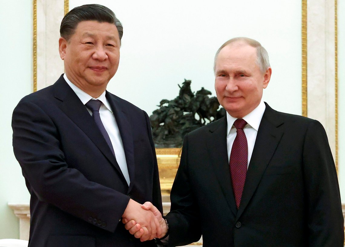 Chinese President Xi Jinping and Russian President Vladimir Putin pose for a photo during their meeting at the Kremlin in Moscow, Russia, Monday, March 20, 2023. (Sergei Karpukhin, Sputnik, Kremlin Pool Photo via AP) Chinese President Xi Jinping and Russian President Vladimir Putin pose for a photo during their meeting at the Kremlin in Moscow, Russia, Monday, March 20, 2023. (Sergei Karpukhin, Sputnik, Kremlin Pool Photo via AP)