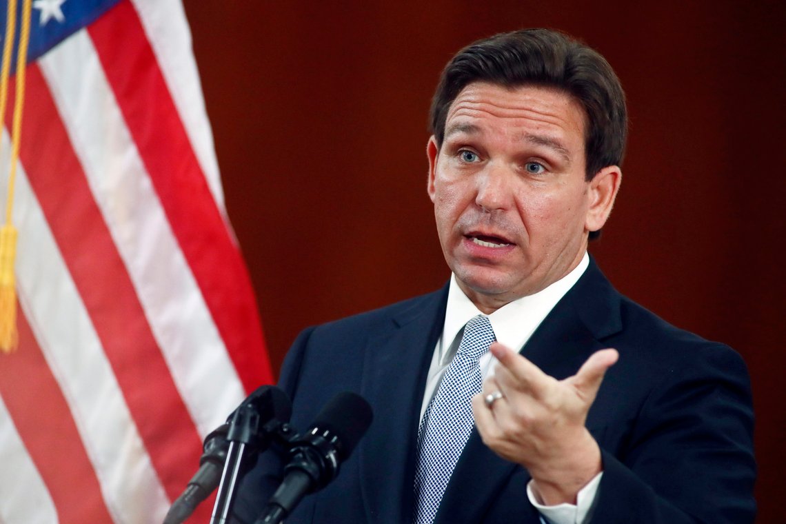 FILE - Florida Gov. Ron DeSantis answers questions from the media in the Florida Cabinet following his State of the State address during a joint session of the Senate and House of Representatives, Tuesday, March 7, 2023, at the state Capitol in Tallahassee, Fla. Texas and Florida are being led by tough-talking Republican governors weighing presidential runs as their state lawmakers debate especially strict legislation on border security. (AP Photo/Phil Sears, File) FILE - Florida Gov. Ron DeSantis answers questions from the media in the Florida Cabinet following his State of the State address during a joint session of the Senate and House of Representatives, Tuesday, March 7, 2023, at the state Capitol in Tallahassee, Fla. Texas and Florida are being led by tough-talking Republican governors weighing presidential runs as their state lawmakers debate especially strict legislation on border security. (AP Photo/Phil Sears, File)