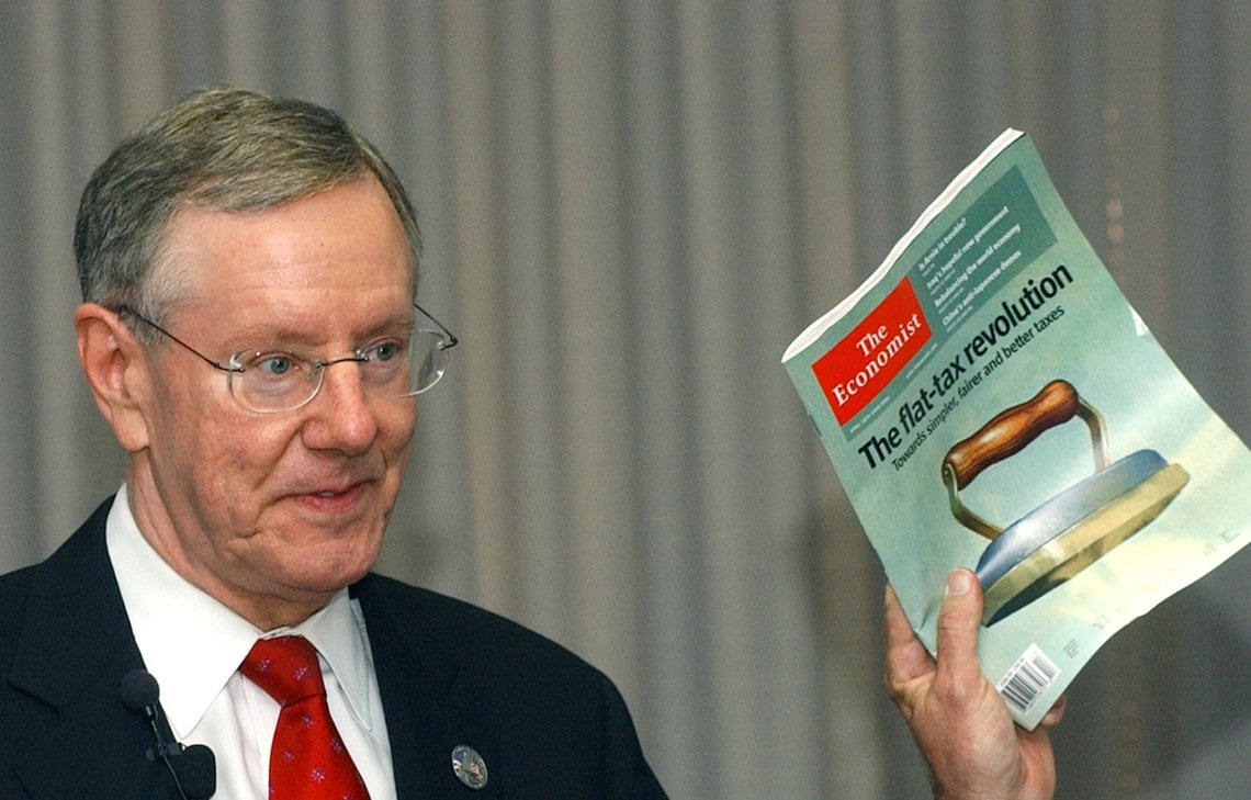 Millionaire publisher and two-time presidential contender Steve Forbes holds a copy of The Economist magazine as he talks about taxes and social security during a news conference Saturday, April 16, 2005, in Des Moines, Iowa. (AP Photo/Steve Pope) Millionaire publisher and two-time presidential contender Steve Forbes holds a copy of The Economist magazine as he talks about taxes and social security during a news conference Saturday, April 16, 2005, in Des Moines, Iowa. (AP Photo/Steve Pope)