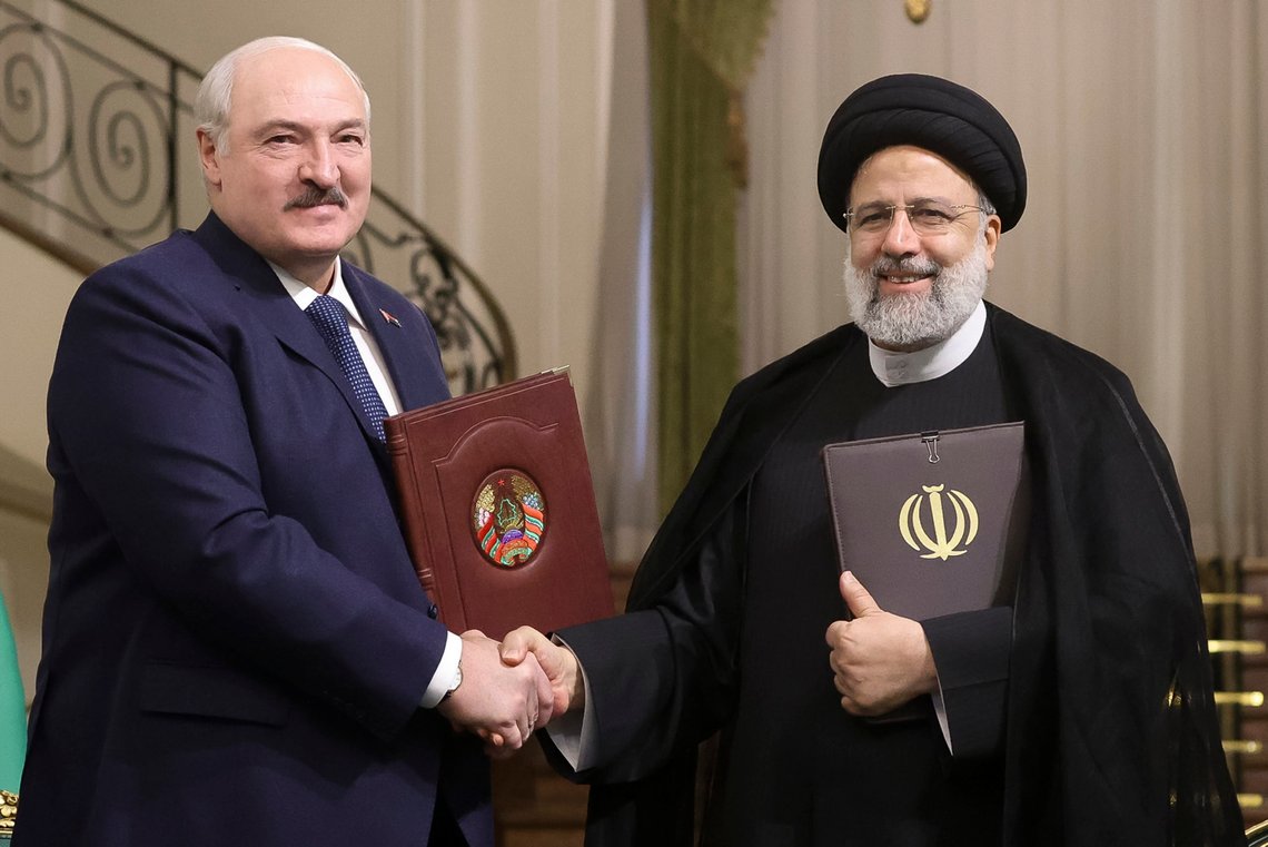 Iranian President Ebrahim Raisi, right, shakes hands with Belarusian President Alexander Lukashenko after a signing ceremony following their talks at the Saadabad Palace in Tehran, Iran, Monday, March 13, 2023. (Pavel Arlouski, BelTA via AP) Iranian President Ebrahim Raisi, right, shakes hands with Belarusian President Alexander Lukashenko after a signing ceremony following their talks at the Saadabad Palace in Tehran, Iran, Monday, March 13, 2023. (Pavel Arlouski, BelTA via AP)