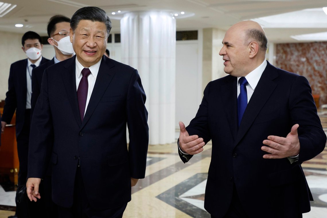 Russian Prime Minister Mikhail Mishustin, right, speaks with Chinese President Xi Jinping during their meeting in Moscow, Russia, Tuesday, March 21, 2023. (Dmitry Astakhov, Sputnik, Government Pool Photo via AP) Russian Prime Minister Mikhail Mishustin, right, speaks with Chinese President Xi Jinping during their meeting in Moscow, Russia, Tuesday, March 21, 2023. (Dmitry Astakhov, Sputnik, Government Pool Photo via AP)