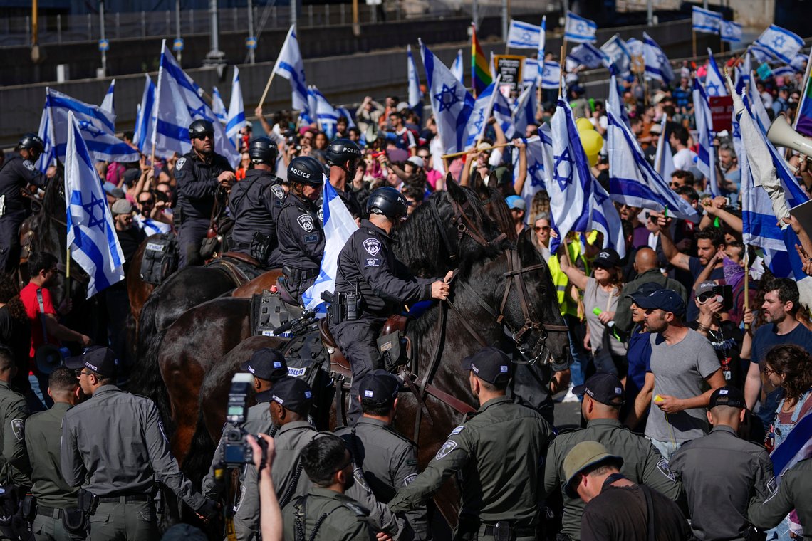 Mounted police try to disperse demonstrators as they block a highway during a protest against plans by Prime Minister Benjamin Netanyahu's government to overhaul the judicial system, in Tel Aviv, Israel, Thursday, March 9, 2023. (AP Photo/Ohad Zwigenberg) Mounted police try to disperse demonstrators as they block a highway during a protest against plans by Prime Minister Benjamin Netanyahu's government to overhaul the judicial system, in Tel Aviv, Israel, Thursday, March 9, 2023. (AP Photo/Ohad Zwigenberg)