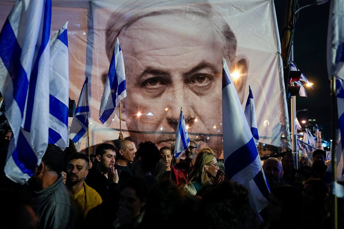Israelis protest against plans by Prime Minister Benjamin Netanyahu's government to overhaul the Israel's judicial system, in Tel Aviv, Israel, Saturday, March 18, 2023. (AP Photo/Ohad Zwigenberg) Israelis protest against plans by Prime Minister Benjamin Netanyahu's government to overhaul the Israel's judicial system, in Tel Aviv, Israel, Saturday, March 18, 2023. (AP Photo/Ohad Zwigenberg)