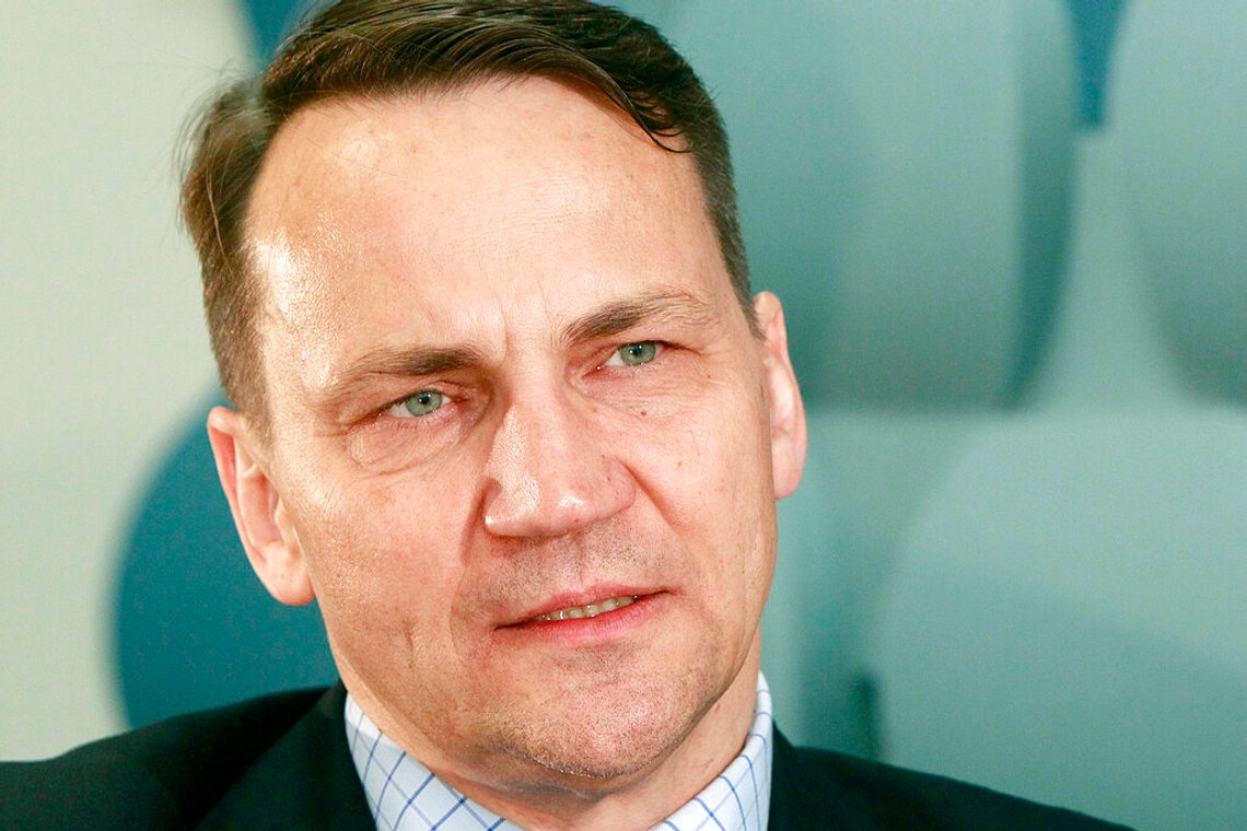 FILE - Radek Sikorski, a former Polish foreign ministers, speaks to The Associated Press in Warsaw, Poland, on Monday May 16, 2016. The Polish ruling party leader Kaczynski, has paid 50,000 zlotys ($11,500) to the Ukrainian army to settle a defamation case with Radek Sikorski, a member of the European Parliament who is a political rival in Poland. (AP Photo/Czarek Sokolowski, File) FILE - Radek Sikorski, a former Polish foreign ministers, speaks to The Associated Press in Warsaw, Poland, on Monday May 16, 2016. The Polish ruling party leader Kaczynski, has paid 50,000 zlotys ($11,500) to the Ukrainian army to settle a defamation case with Radek Sikorski, a member of the European Parliament who is a political rival in Poland. (AP Photo/Czarek Sokolowski, File)