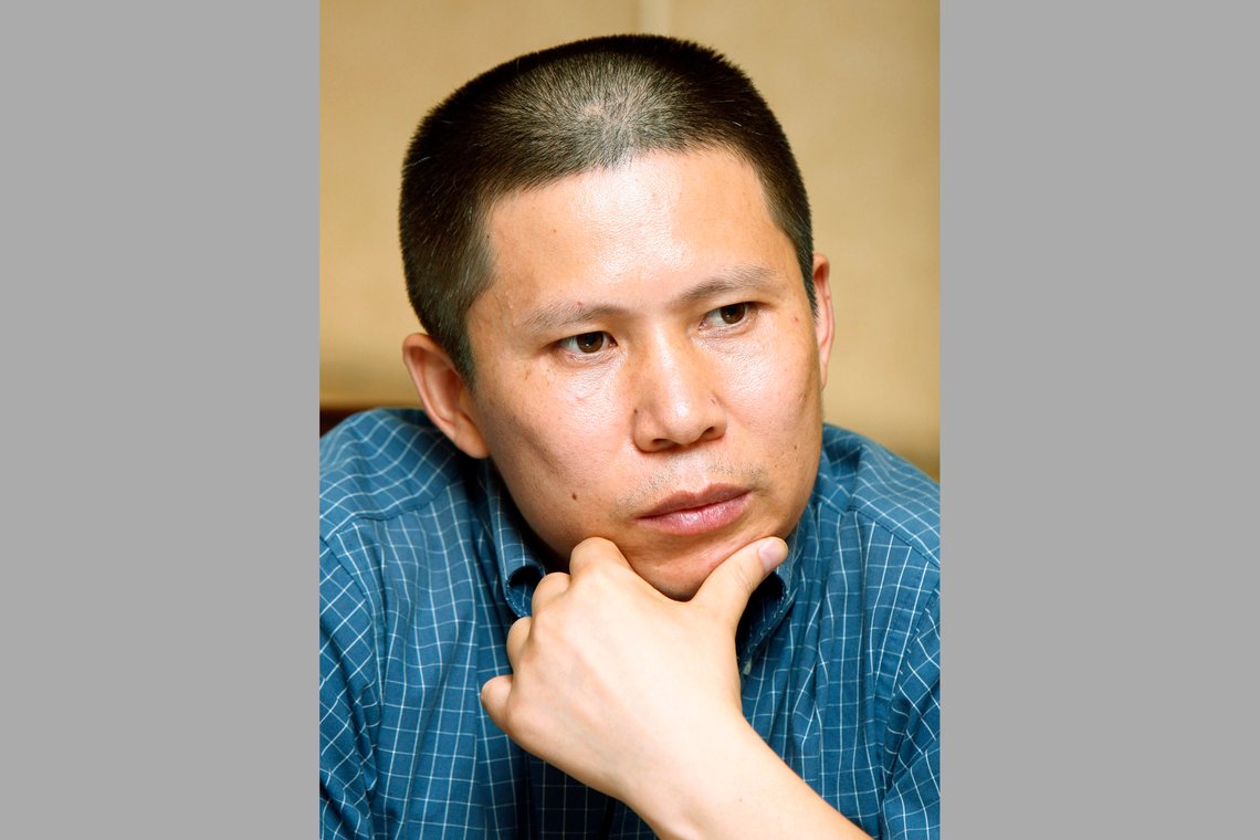 FILE - Legal scholar Xu Zhiyong is seen at a meeting in Beijing, China, on July 17, 2009. Xu and Ding Jiaxi, two prominent Chinese human rights lawyers, have been sentenced to more than a decade in prison, Human Rights Watch said Monday, April 10, 2023, the latest in a crackdown by the ruling Communist Party on its critics. (AP Photo/Greg Baker, File) FILE - Legal scholar Xu Zhiyong is seen at a meeting in Beijing, China, on July 17, 2009. Xu and Ding Jiaxi, two prominent Chinese human rights lawyers, have been sentenced to more than a decade in prison, Human Rights Watch said Monday, April 10, 2023, the latest in a crackdown by the ruling Communist Party on its critics. (AP Photo/Greg Baker, File)