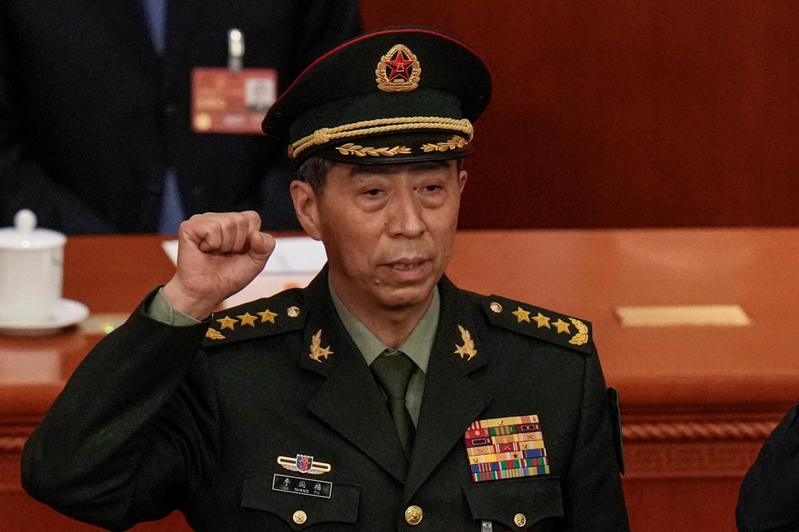 Newly elected Chinese Defense Minister Gen. Li Shangfu takes his oath during a session of China's National People's Congress (NPC) at the Great Hall of the People in Beijing on March 12, 2023. Russian President Vladimir Putin met with Li on Sunday, April 16, 2023, underscoring Beijing's strengthening engagement with Moscow, with which it has largely aligned its foreign policy in an attempt to diminish the influence of the United States and other Western democracies. (AP Photo/Andy Wong) Newly elected Chinese Defense Minister Gen. Li Shangfu takes his oath during a session of China's National People's Congress (NPC) at the Great Hall of the People in Beijing on March 12, 2023. Russian President Vladimir Putin met with Li on Sunday, April 16, 2023, underscoring Beijing's strengthening engagement with Moscow, with which it has largely aligned its foreign policy in an attempt to diminish the influence of the United States and other Western democracies. (AP Photo/Andy Wong)