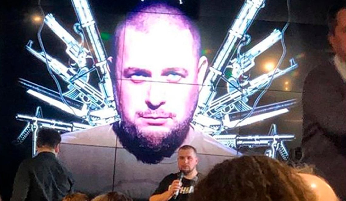 Russian blogger Vladlen Tatarsky speaks during a party in front of projection of an image of him, before an explosion at a cafe in St. Petersburg, Russia, Sunday, April 2, 2023. An explosion tore through a cafe in the Russian city of St. Petersburg on Sunday, and preliminary reports suggested a prominent military blogger was killed and more than a dozen people were injured. Russian news reports said blogger Vladlen Tatarsky was killed and 15 people were hurt in the explosion at the "Street Bar" cafe in Russia's second largest city. (AP Photo) Russian blogger Vladlen Tatarsky speaks during a party in front of projection of an image of him, before an explosion at a cafe in St. Petersburg, Russia, Sunday, April 2, 2023. An explosion tore through a cafe in the Russian city of St. Petersburg on Sunday, and preliminary reports suggested a prominent military blogger was killed and more than a dozen people were injured. Russian news reports said blogger Vladlen Tatarsky was killed and 15 people were hurt in the explosion at the "Street Bar" cafe in Russia's second largest city. (AP Photo)