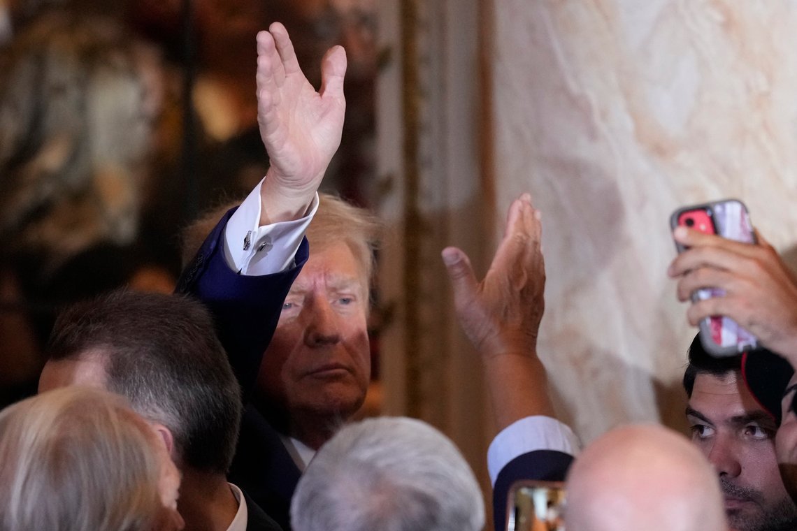 Former President Donald Trump waves to supporters after speaking at his Mar-a-Lago estate hours after being arraigned in New York City, Tuesday, April 4, 2023, in Palm Beach, Fla. (AP Photo/Rebecca Blackwell) Former President Donald Trump waves to supporters after speaking at his Mar-a-Lago estate hours after being arraigned in New York City, Tuesday, April 4, 2023, in Palm Beach, Fla. (AP Photo/Rebecca Blackwell)