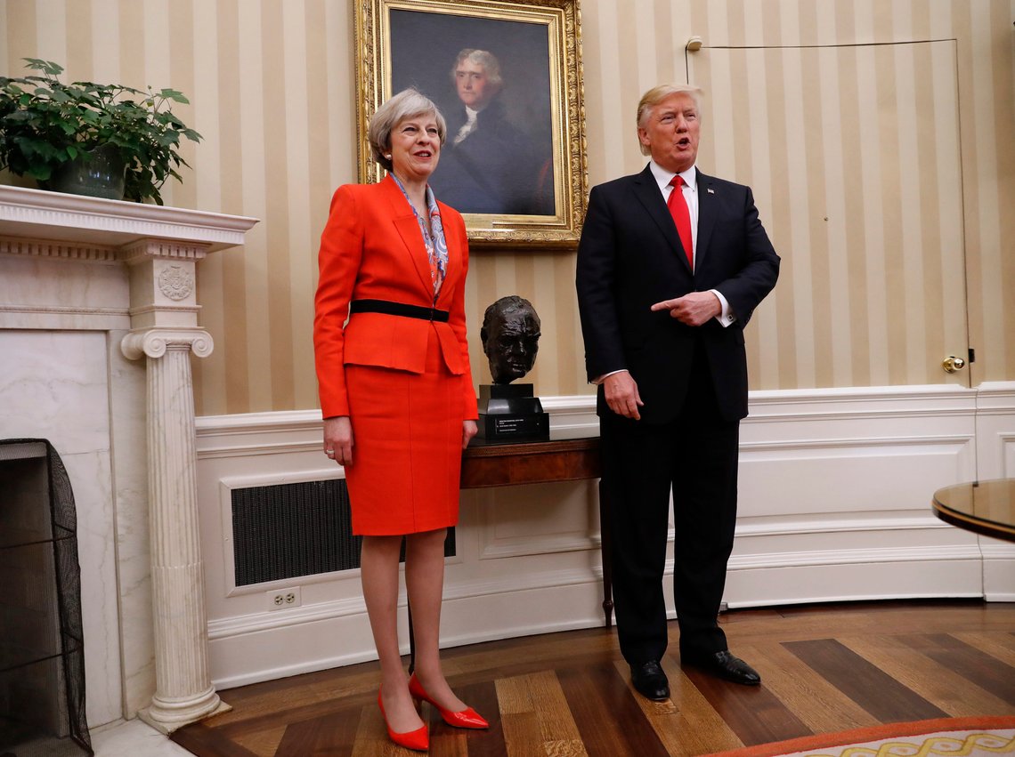 President Donald Trump points to the bust of British Prime Minister Winston Churchill as he poses for photographs with British Prime Minister Theresa May in the Oval Office of the White House in Washington, Friday, Jan. 27, 2017. (AP Photo/Pablo Martinez Monsivais) President Donald Trump points to the bust of British Prime Minister Winston Churchill as he poses for photographs with British Prime Minister Theresa May in the Oval Office of the White House in Washington, Friday, Jan. 27, 2017. (AP Photo/Pablo Martinez Monsivais)