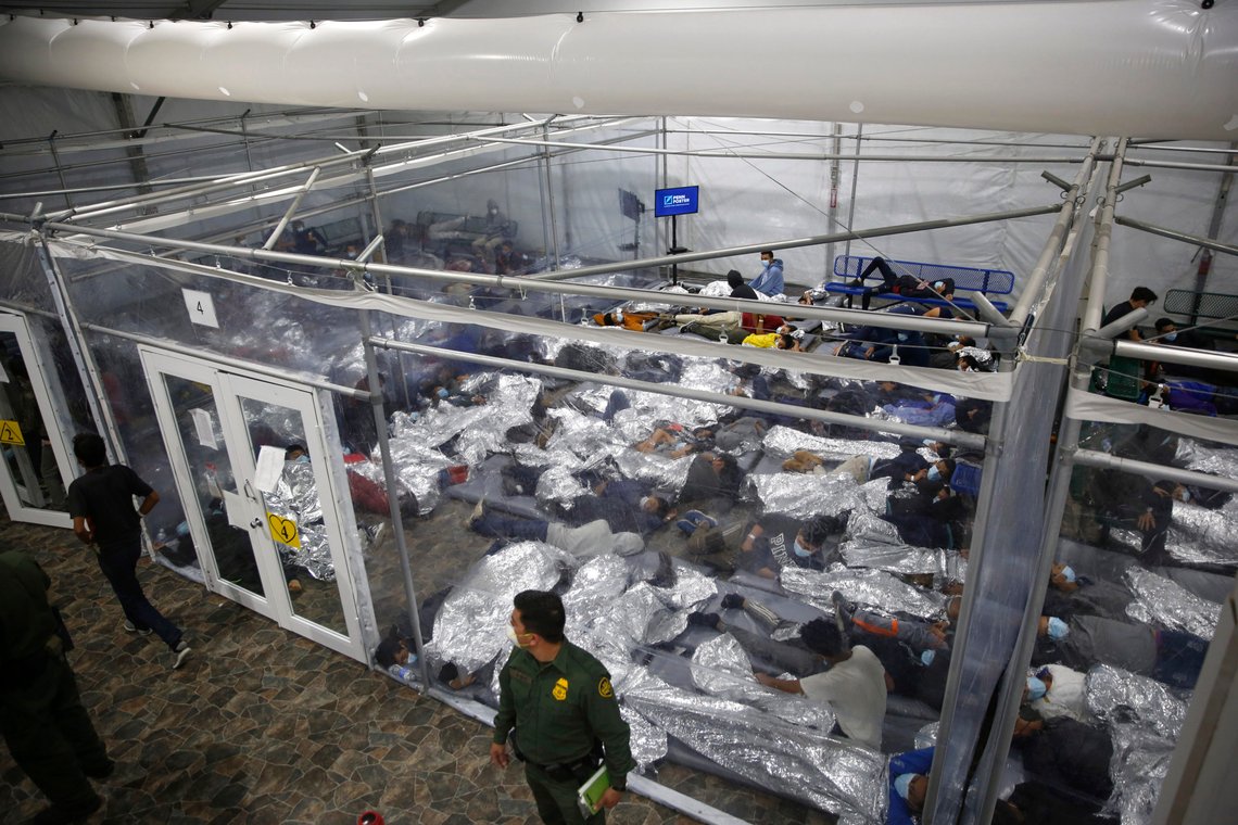 FILE - Children lie inside a pod at the main detention center for unaccompanied children in the Rio Grande Valley run by U.S. Customs and Border Protection (CBP), in Donna, Texas, March 30, 2021. (AP Photo/Dario Lopez-Mills, Pool, File) FILE - Children lie inside a pod at the main detention center for unaccompanied children in the Rio Grande Valley run by U.S. Customs and Border Protection (CBP), in Donna, Texas, March 30, 2021. (AP Photo/Dario Lopez-Mills, Pool, File)