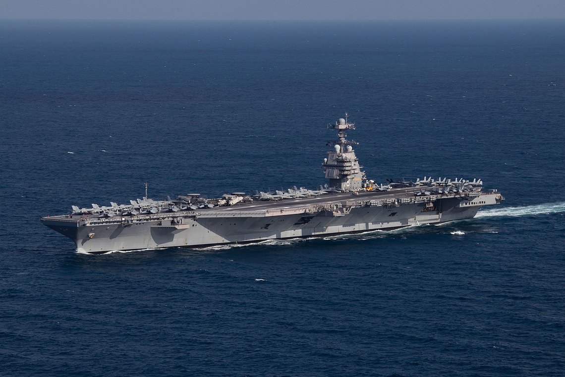 221009-N-TL968-1248 ATLANTIC OCEAN (Oct. 9, 2022) The first-in-class aircraft carrier USS Gerald R. Ford (CVN 78) steams the Atlantic Ocean during a simulated straits transit with the Gerald R. Ford Carrier Strike Group (GRFCSG) in the Atlantic Ocean, Oct. 9, 2022. The Gerald R. Ford Carrier Strike Group is deployed in the Atlantic Ocean, conducting training and operations alongside NATO Allies and partners to enhance integration for future operations and demonstrate the U.S. Navy's commitment to a peaceful, stable and conflict-free Atlantic region. (U.S. Navy photo by Mass Communication Specialist 2nd Class Jackson Adkins) 221009-N-TL968-1248 ATLANTIC OCEAN (Oct. 9, 2022) The first-in-class aircraft carrier USS Gerald R. Ford (CVN 78) steams the Atlantic Ocean during a simulated straits transit with the Gerald R. Ford Carrier Strike Group (GRFCSG) in the Atlantic Ocean, Oct. 9, 2022. The Gerald R. Ford Carrier Strike Group is deployed in the Atlantic Ocean, conducting training and operations alongside NATO Allies and partners to enhance integration for future operations and demonstrate the U.S. Navy's commitment to a peaceful, stable and conflict-free Atlantic region. (U.S. Navy photo by Mass Communication Specialist 2nd Class Jackson Adkins)