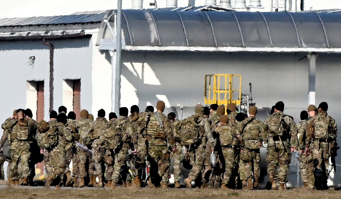 FILE - U.S. Army troops of the 82nd Airborne Division just after arrival at the Rzeszow-Jasionka airport in southeastern Poland, on Tuesday, Feb. 15, 2022. At a NATO summit on Thursday, March 24, 2022 leaders are set to discuss the longer-term future of NATO's defences along its eastern flank, ranging from Estonia in the north, down to around Western Ukraine to Bulgaria on the Black Sea. (AP Photo, File) FILE - U.S. Army troops of the 82nd Airborne Division just after arrival at the Rzeszow-Jasionka airport in southeastern Poland, on Tuesday, Feb. 15, 2022. At a NATO summit on Thursday, March 24, 2022 leaders are set to discuss the longer-term future of NATO's defences along its eastern flank, ranging from Estonia in the north, down to around Western Ukraine to Bulgaria on the Black Sea. (AP Photo, File)