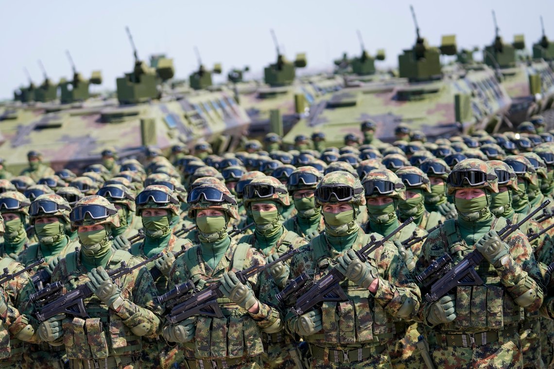 Serbian Army soldiers perform during a military exercise, at Batajnica Air Base near Belgrade, Serbia, Saturday, April 22, 2023. The populist leaders of Serbia and Hungary are observing a Serbian military exercise. Hungarian Prime Minister Viktor Orban arrived in Serbia on Saturday for a previously unannounced visit. He was greeted by Serbian President Aleksandar Vucic, who said "Serbian-Hungarian relations are at the highest level in the history of our countries.” (AP Photo/Darko Vojinovic) Serbian Army soldiers perform during a military exercise, at Batajnica Air Base near Belgrade, Serbia, Saturday, April 22, 2023. The populist leaders of Serbia and Hungary are observing a Serbian military exercise. Hungarian Prime Minister Viktor Orban arrived in Serbia on Saturday for a previously unannounced visit. He was greeted by Serbian President Aleksandar Vucic, who said "Serbian-Hungarian relations are at the highest level in the history of our countries.” (AP Photo/Darko Vojinovic)