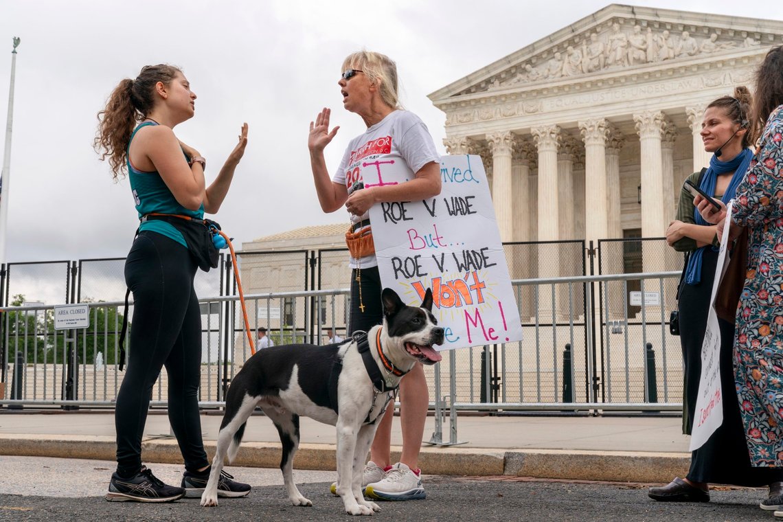 FILE - Lilo Blank, 23, of Philadelphia, left, who supports abortion rights, and Lisa Verdonik, of Arlington, Va., who is anti-abortion, talk about their opposing views on abortion rights, Friday, May 13, 2022, outside the Supreme Court in Washington, ahead of expected abortion rights rallies across the country on Saturday. One year ago, the U.S. Supreme Court rescinded a five-decade-old right to abortion, prompting a seismic shift in debates about politics, values, freedom and fairness. (AP Photo/Jacquelyn Martin, File) FILE - Lilo Blank, 23, of Philadelphia, left, who supports abortion rights, and Lisa Verdonik, of Arlington, Va., who is anti-abortion, talk about their opposing views on abortion rights, Friday, May 13, 2022, outside the Supreme Court in Washington, ahead of expected abortion rights rallies across the country on Saturday. One year ago, the U.S. Supreme Court rescinded a five-decade-old right to abortion, prompting a seismic shift in debates about politics, values, freedom and fairness. (AP Photo/Jacquelyn Martin, File)