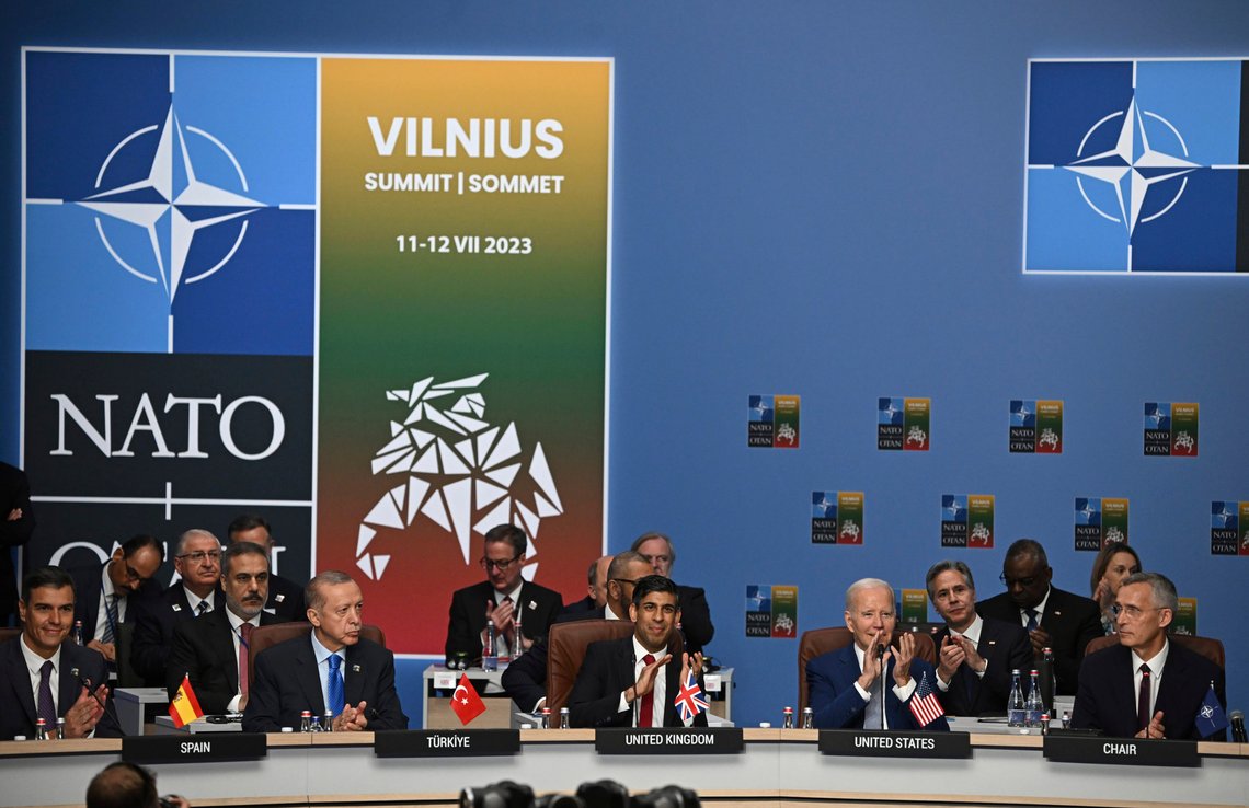 From left, Spain's Prime Minister Pedro Sanchez, Turkey's President Recep Tayyip Erdogan, Britain's Prime Minister Rishi Sunak, US President Joe Biden and NATO Secretary General Jens Stoltenberg applaud at the start of the meeting of the North Atlantic Council (NAC) during the NATO Summit in Vilnius , Lithuania, Tuesday July 11, 2023. (Paul Ellis/Pool Photo via AP) From left, Spain's Prime Minister Pedro Sanchez, Turkey's President Recep Tayyip Erdogan, Britain's Prime Minister Rishi Sunak, US President Joe Biden and NATO Secretary General Jens Stoltenberg applaud at the start of the meeting of the North Atlantic Council (NAC) during the NATO Summit in Vilnius , Lithuania, Tuesday July 11, 2023. (Paul Ellis/Pool Photo via AP)