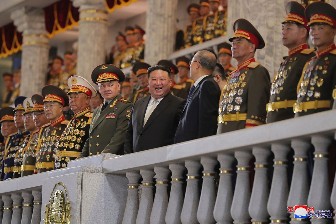 In this photo provided by the North Korean government, North Korean leader Kim Jong Un, center, talks with China's Vice Chairman of the standing committee of the country’s National People’s Congress Li Hongzhong, fourth right, as they and Russian Defense Minister Sergei Shoigu, sixth right, attend a military parade to mark the 70th anniversary of the armistice that halted fighting in the 1950-53 Korean War, on Kim Il Sung Square in Pyongyang, North Korea Thursday, July 27, 2023. Independent journalists were not given access to cover the event depicted in this image distributed by the North Korean government. The content of this image is as provided and cannot be independently verified. Korean language watermark on image as provided by source reads: "KCNA" which is the abbreviation for Korean Central News Agency. (Korean Central News Agency/Korea News Service via AP) In this photo provided by the North Korean government, North Korean leader Kim Jong Un, center, talks with China's Vice Chairman of the standing committee of the country’s National People’s Congress Li Hongzhong, fourth right, as they and Russian Defense Minister Sergei Shoigu, sixth right, attend a military parade to mark the 70th anniversary of the armistice that halted fighting in the 1950-53 Korean War, on Kim Il Sung Square in Pyongyang, North Korea Thursday, July 27, 2023. Independent journalists were not given access to cover the event depicted in this image distributed by the North Korean government. The content of this image is as provided and cannot be independently verified. Korean language watermark on image as provided by source reads: "KCNA" which is the abbreviation for Korean Central News Agency. (Korean Central News Agency/Korea News Service via AP)