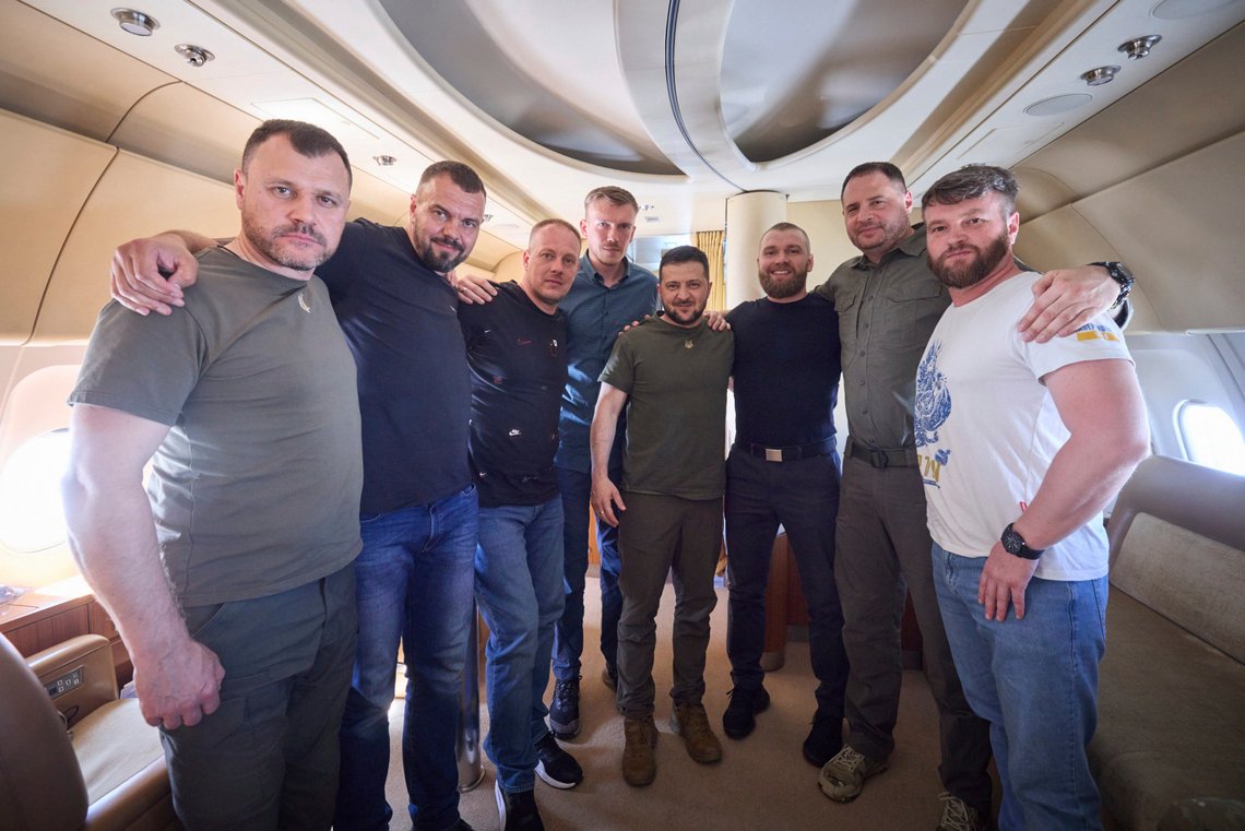 In this photo provided by the Ukrainian Presidential Press Office, frome left: Interior Minister Ihor Klymenko, defenders of the Azovstal steel plant Oleh Khomenko, Denys Shleha, Denys Prokopenko, Ukrainian President Volodymyr Zelenskyy, defender of the Azovstal Serhii Volynskyi, Head of the Presidential Office Andriy Yermak and deputy commander of the Azov regiment Svyatoslav Palamar pose for the picture inside a plane during their flight from Turkey to Ukraine, Saturday, July 8, 2023. Five commanders of the defence of the Azovstal steel plant, a gruelling months-long siege early in the war, were returning from Turkey on the plane with Zelenskyy. (Ukrainian Presidential Press Office via AP) In this photo provided by the Ukrainian Presidential Press Office, frome left: Interior Minister Ihor Klymenko, defenders of the Azovstal steel plant Oleh Khomenko, Denys Shleha, Denys Prokopenko, Ukrainian President Volodymyr Zelenskyy, defender of the Azovstal Serhii Volynskyi, Head of the Presidential Office Andriy Yermak and deputy commander of the Azov regiment Svyatoslav Palamar pose for the picture inside a plane during their flight from Turkey to Ukraine, Saturday, July 8, 2023. Five commanders of the defence of the Azovstal steel plant, a gruelling months-long siege early in the war, were returning from Turkey on the plane with Zelenskyy. (Ukrainian Presidential Press Office via AP)