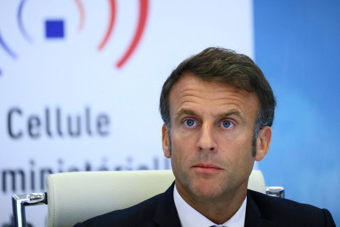French President Emmanuel Macron attends a government emergency meeting after riots erupted for the third night in a row across the country, at the Interior Ministry in Paris, Friday, June 30, 2023. Emmanuel Macron is urging parents to keep teenagers at home to quell rioting spreading across France and says social media are fueling copycat violence. Emmanuel Macron said that social media are playing a "considerable role" in the spreading unrest triggered by the deadly police shooting of a 17 year old. (Yves Herman/Pool via AP) French President Emmanuel Macron attends a government emergency meeting after riots erupted for the third night in a row across the country, at the Interior Ministry in Paris, Friday, June 30, 2023. Emmanuel Macron is urging parents to keep teenagers at home to quell rioting spreading across France and says social media are fueling copycat violence. Emmanuel Macron said that social media are playing a "considerable role" in the spreading unrest triggered by the deadly police shooting of a 17 year old. (Yves Herman/Pool via AP)