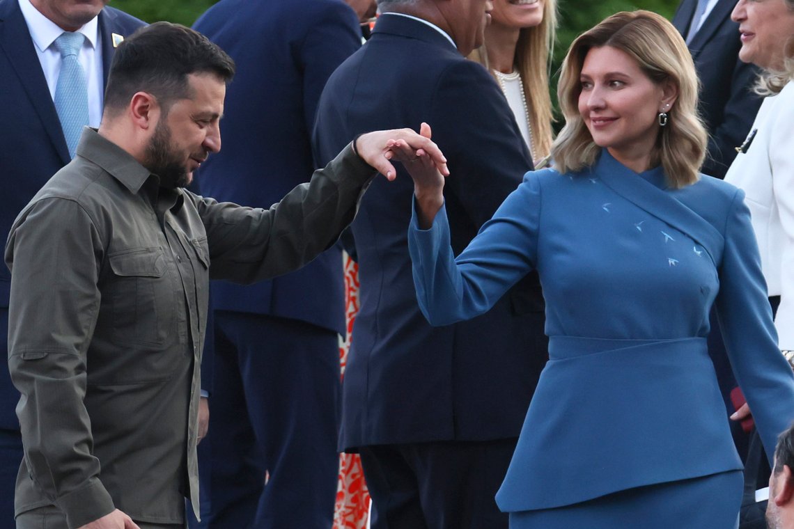 Ukrainian President Volodymyr Zelenskyy and his wife Olena Zelenska pose during a group photo at a social dinner during the NATO summit in Vilnius, Lithuania, Tuesday, July 11, 2023. NATO's summit began Tuesday with fresh momentum after Turkey withdrew its objections to Sweden joining the alliance, a step toward the unity that Western leaders have been eager to demonstrate in the face of Russia's invasion of Ukraine. (Yves Herman, Pool Photo via AP) Ukrainian President Volodymyr Zelenskyy and his wife Olena Zelenska pose during a group photo at a social dinner during the NATO summit in Vilnius, Lithuania, Tuesday, July 11, 2023. NATO's summit began Tuesday with fresh momentum after Turkey withdrew its objections to Sweden joining the alliance, a step toward the unity that Western leaders have been eager to demonstrate in the face of Russia's invasion of Ukraine. (Yves Herman, Pool Photo via AP)