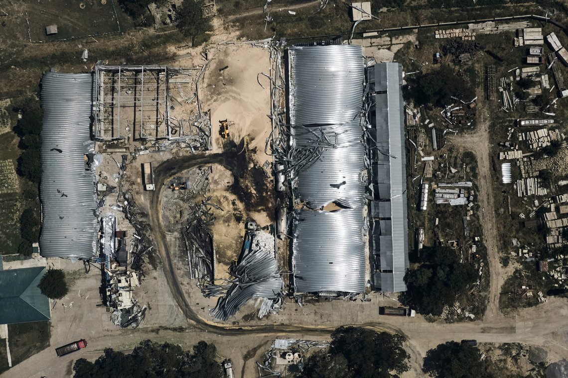 A farm storage building is seen heavily damaged after a Russian attack in Odesa region, Ukraine, Friday, July 21, 2023. A missile barrage injured two people, damaged equipment and destroyed 100 metric tons of peas and 20 metric tons of barley, regional Gov. Oleh Kiper said. (AP Photo/Libkos) A farm storage building is seen heavily damaged after a Russian attack in Odesa region, Ukraine, Friday, July 21, 2023. A missile barrage injured two people, damaged equipment and destroyed 100 metric tons of peas and 20 metric tons of barley, regional Gov. Oleh Kiper said. (AP Photo/Libkos)