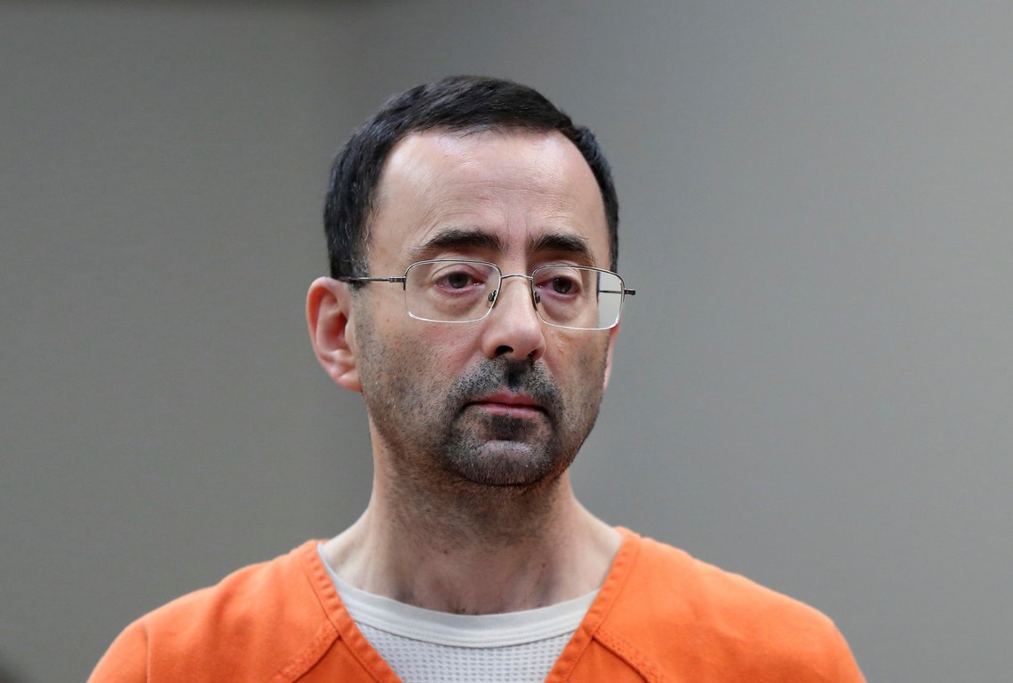 FILE - Dr. Larry Nassar, appears in court for a plea hearing on Nov. 22, 2017, in Lansing, Mich. The U.S. Justice Department said Thursday, May 26, 2022 it will not pursue criminal charges against former FBI agents who failed to quickly open an investigation of sports doctor Larry Nassar despite learning in 2015 that he was accused of sexually assaulting female gymnasts.(. (AP Photo/Paul Sancya File) FILE - Dr. Larry Nassar, appears in court for a plea hearing on Nov. 22, 2017, in Lansing, Mich. The U.S. Justice Department said Thursday, May 26, 2022 it will not pursue criminal charges against former FBI agents who failed to quickly open an investigation of sports doctor Larry Nassar despite learning in 2015 that he was accused of sexually assaulting female gymnasts.(. (AP Photo/Paul Sancya File)