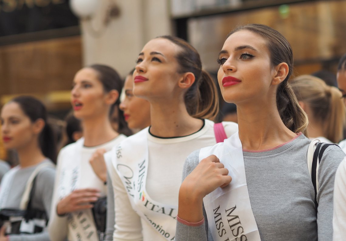 MILAN, Italy: 10 September 2018: Miss Italia models posing in VIttorio Emanuele II gallery after presentation to mayor of Milan Giuseppe Sala to Marino palace. Photo: Shutterstock by Luca Ponti, Italy. MILAN, Italy: 10 September 2018: Miss Italia models posing in VIttorio Emanuele II gallery after presentation to mayor of Milan Giuseppe Sala to Marino palace. Photo: Shutterstock by Luca Ponti, Italy.