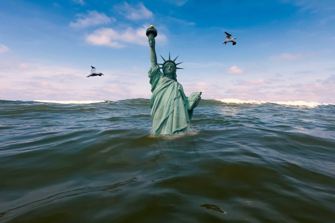 The Statue of Liberty is half submerged after sea levels rise. Photo: Shutterstock by pixelschoen. The Statue of Liberty is half submerged after sea levels rise. Photo: Shutterstock by pixelschoen.