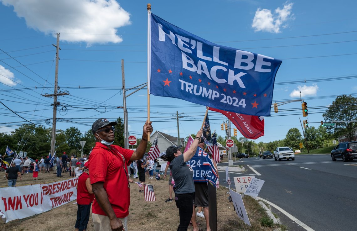 BEDMINSTER, N.J. – August 14, 2022: Demonstrators rally during a ‘Stand with Trump’ event following an FBI search at former President Donald Trump’s Mar-a-Lago home. Photo: Shutterstock by Ben Von Klemperer, United States. BEDMINSTER, N.J. – August 14, 2022: Demonstrators rally during a ‘Stand with Trump’ event following an FBI search at former President Donald Trump’s Mar-a-Lago home. Photo: Shutterstock by Ben Von Klemperer, United States.