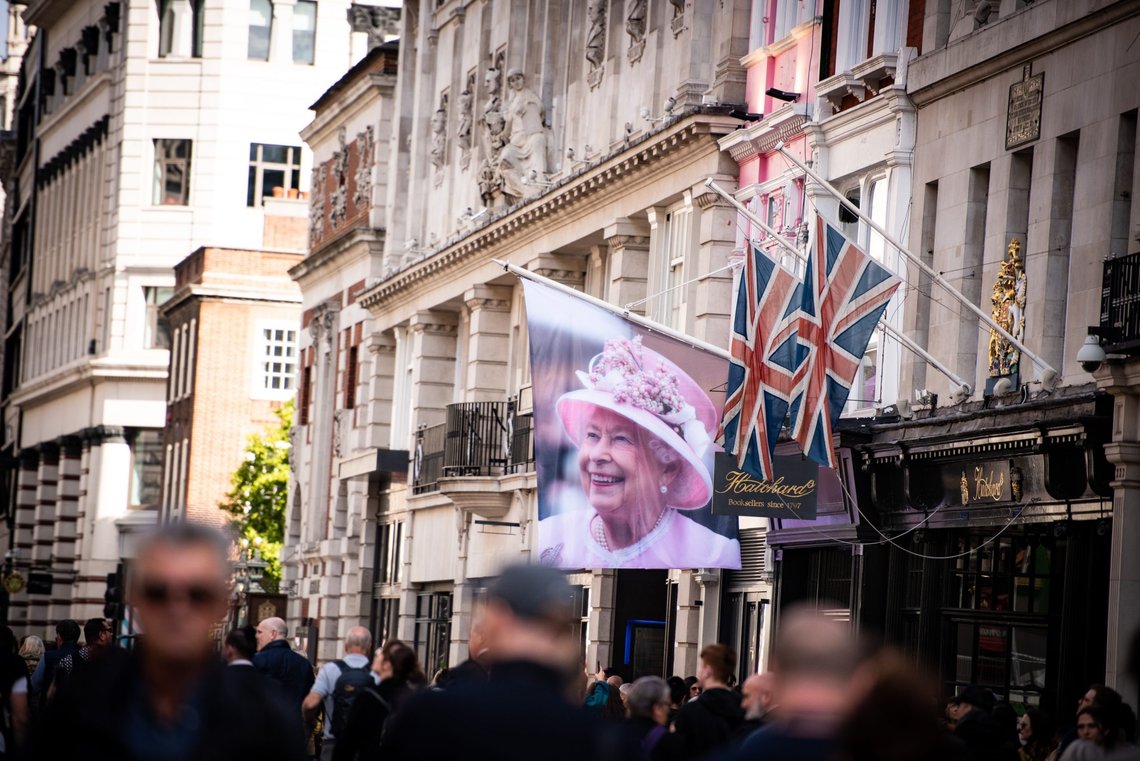 London, England, UK - September 19, 2022: Displays of Queen Elizabeth II are seen during QUEEN ELIZABETH II’s Funeral Procession. Shutterstock by Loredana Sangiuliano. London, England, UK - September 19, 2022: Displays of Queen Elizabeth II are seen during QUEEN ELIZABETH II’s Funeral Procession. Shutterstock by Loredana Sangiuliano.